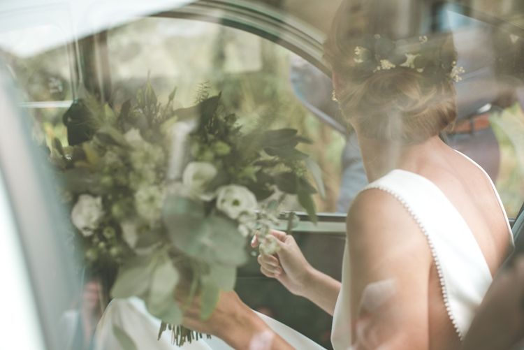 Bride getting out of the car