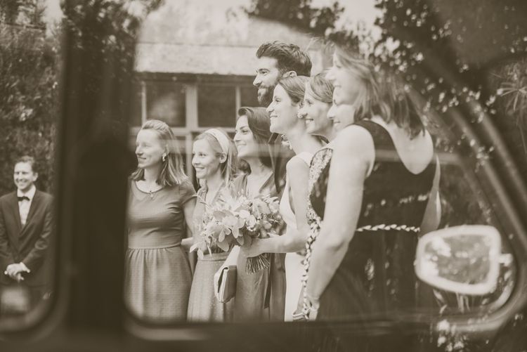 group photo through car