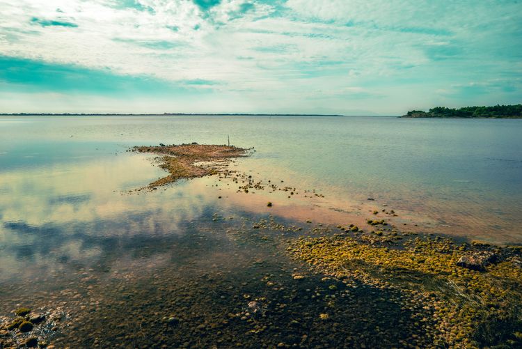 reflections water clouds and stones 