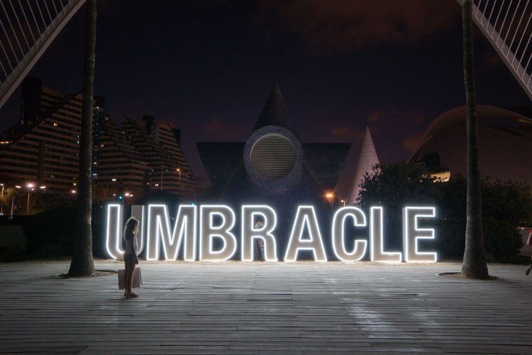 little girl staring at light installation, Valencia, 2019