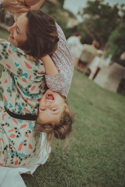 Mother and daughter laughing