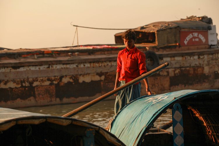 Young man in the Ganges River