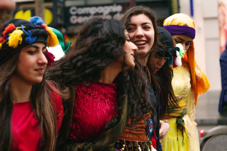 Group of girls walking together to protest 