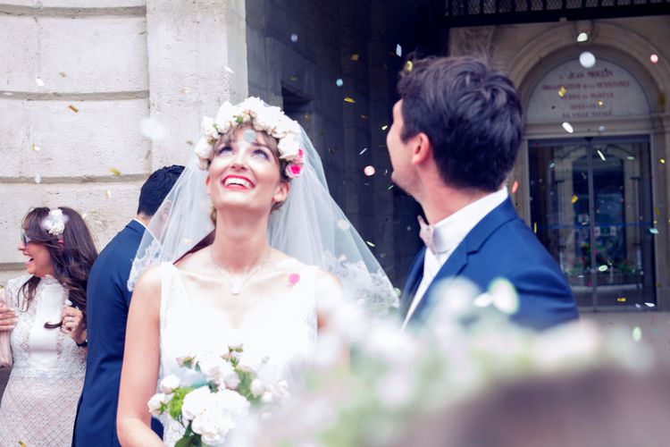Bride getting out of the church